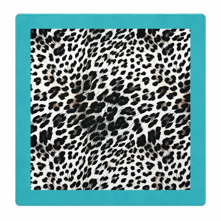A square mahjong mat featuring black and white leopard print pattern in the center, surrounded by a solid turquoise blue border on a white background.