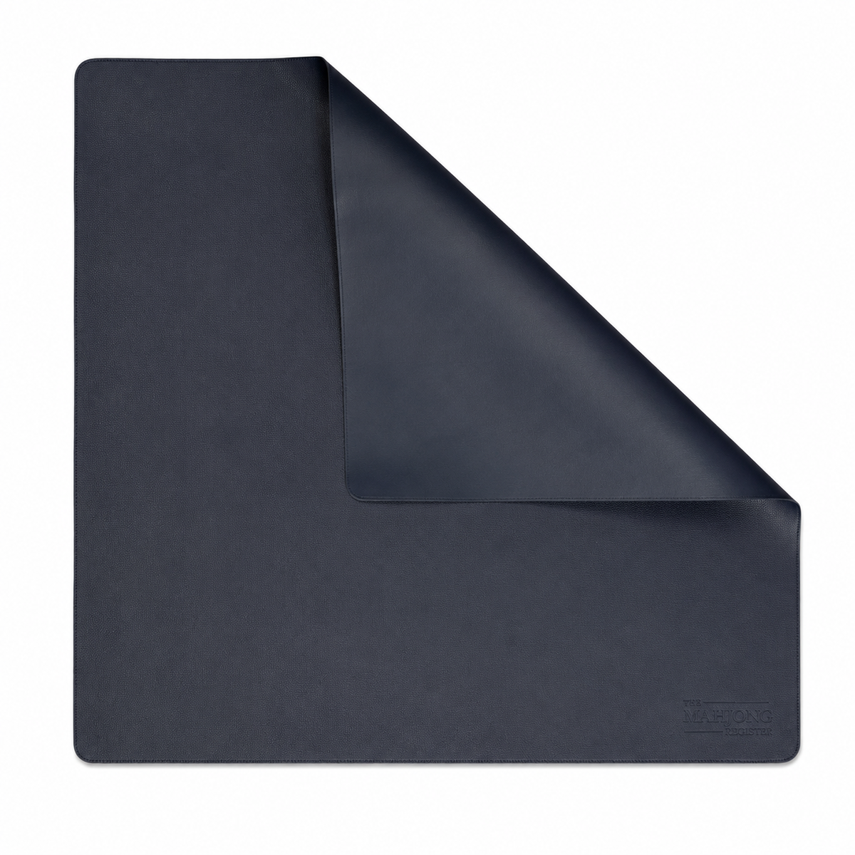 Our Navy Leatherette Mahjong Mat was designed for players who prefer a simpler, more refined aesthetic. The deep navy color and smooth leatherette surface create a polished backdrop for your game without competing with your tiles or racks.