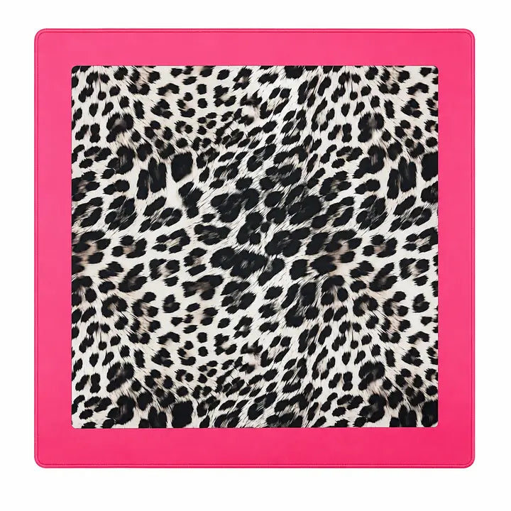 A square mahjong mat with a bright hot pink border and a central leopard print pattern featuring black, brown, and beige spots on a white background.